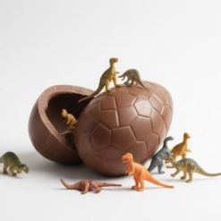 xocomon milk chocolate egg, with surprise inside (toy dinosaurs)